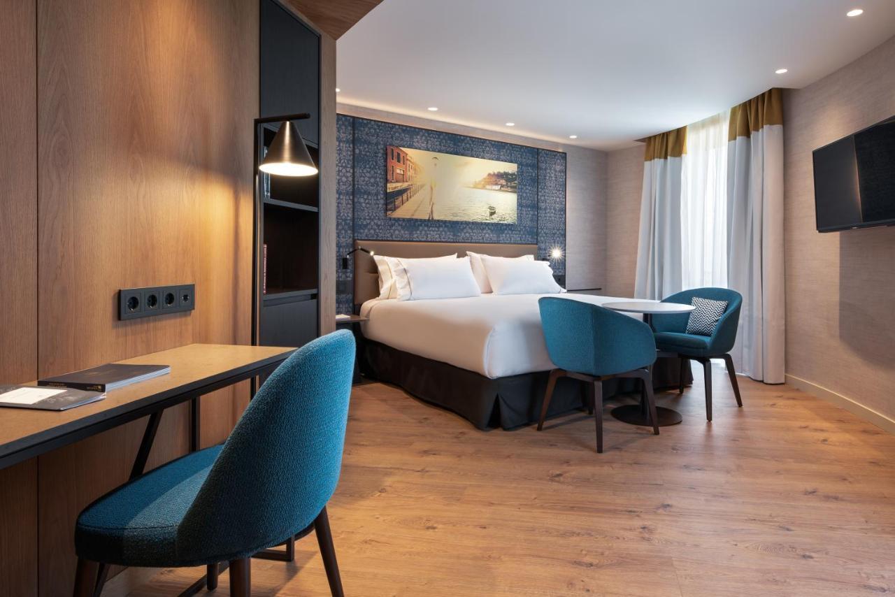 Eurostars Aliados 호텔 포르투 외부 사진 A room at the hotel