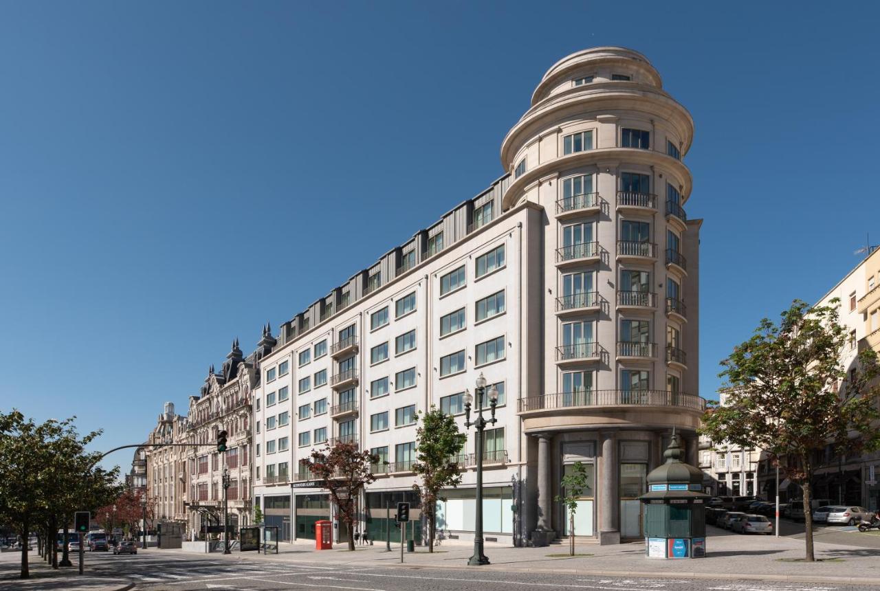 Eurostars Aliados 호텔 포르투 외부 사진 The former department store, now apartments