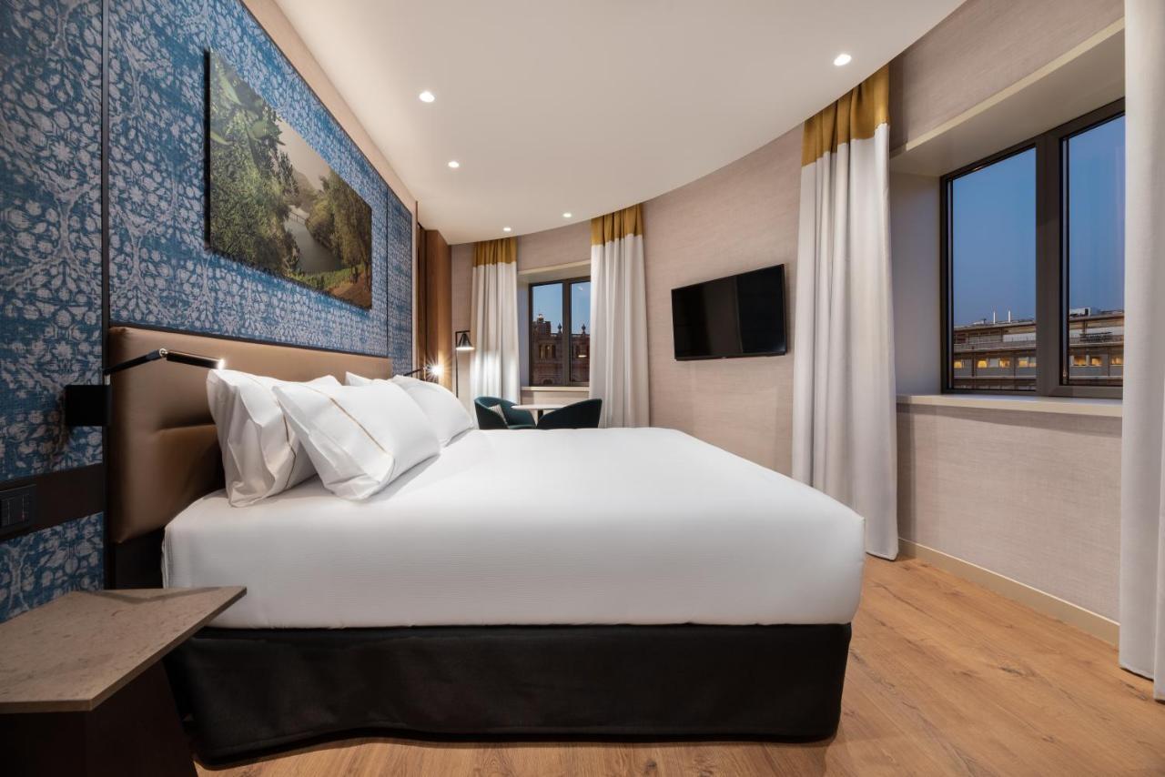 Eurostars Aliados 호텔 포르투 외부 사진 A bedroom at the hotel