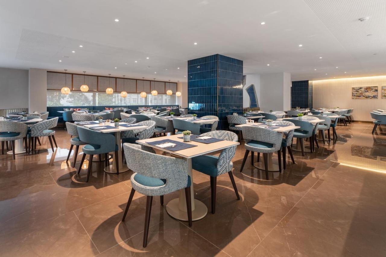 Eurostars Aliados 호텔 포르투 외부 사진 The lounge at London Heathrow Airport
