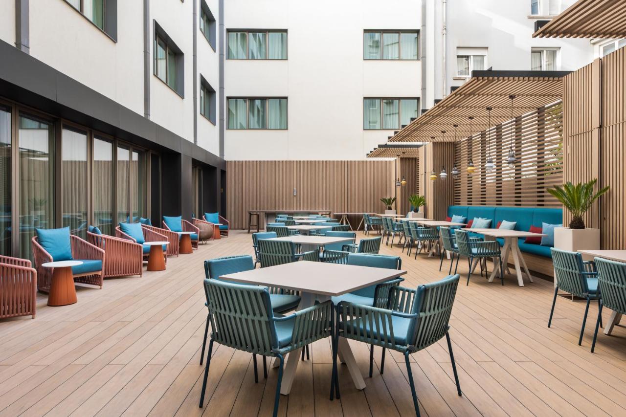 Eurostars Aliados 호텔 포르투 외부 사진 The hotel's courtyard