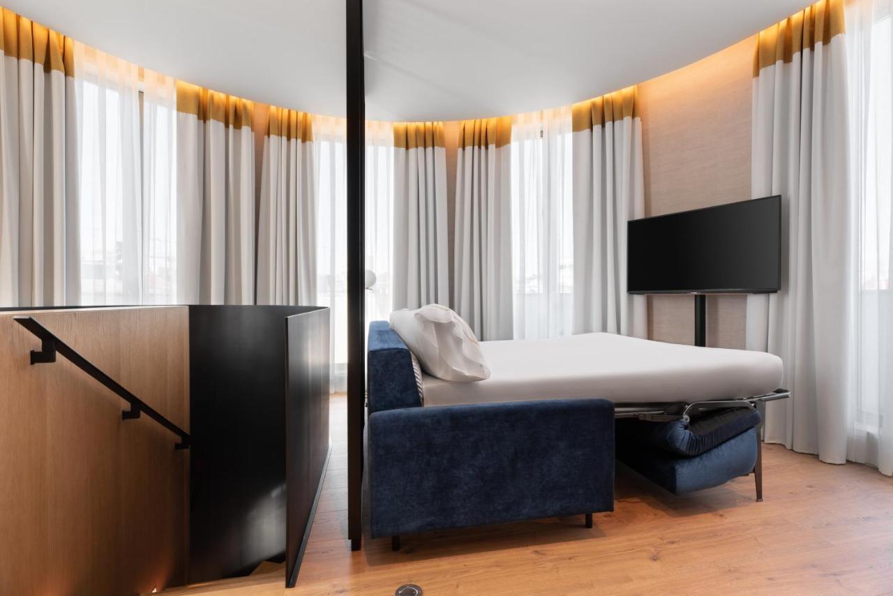 Eurostars Aliados 호텔 포르투 외부 사진 A sofa bed