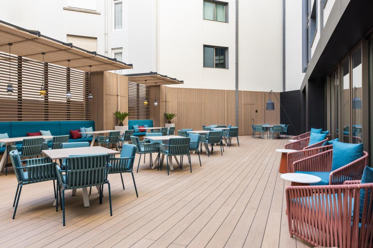 Eurostars Aliados 호텔 포르투 외부 사진 The hotel's courtyard